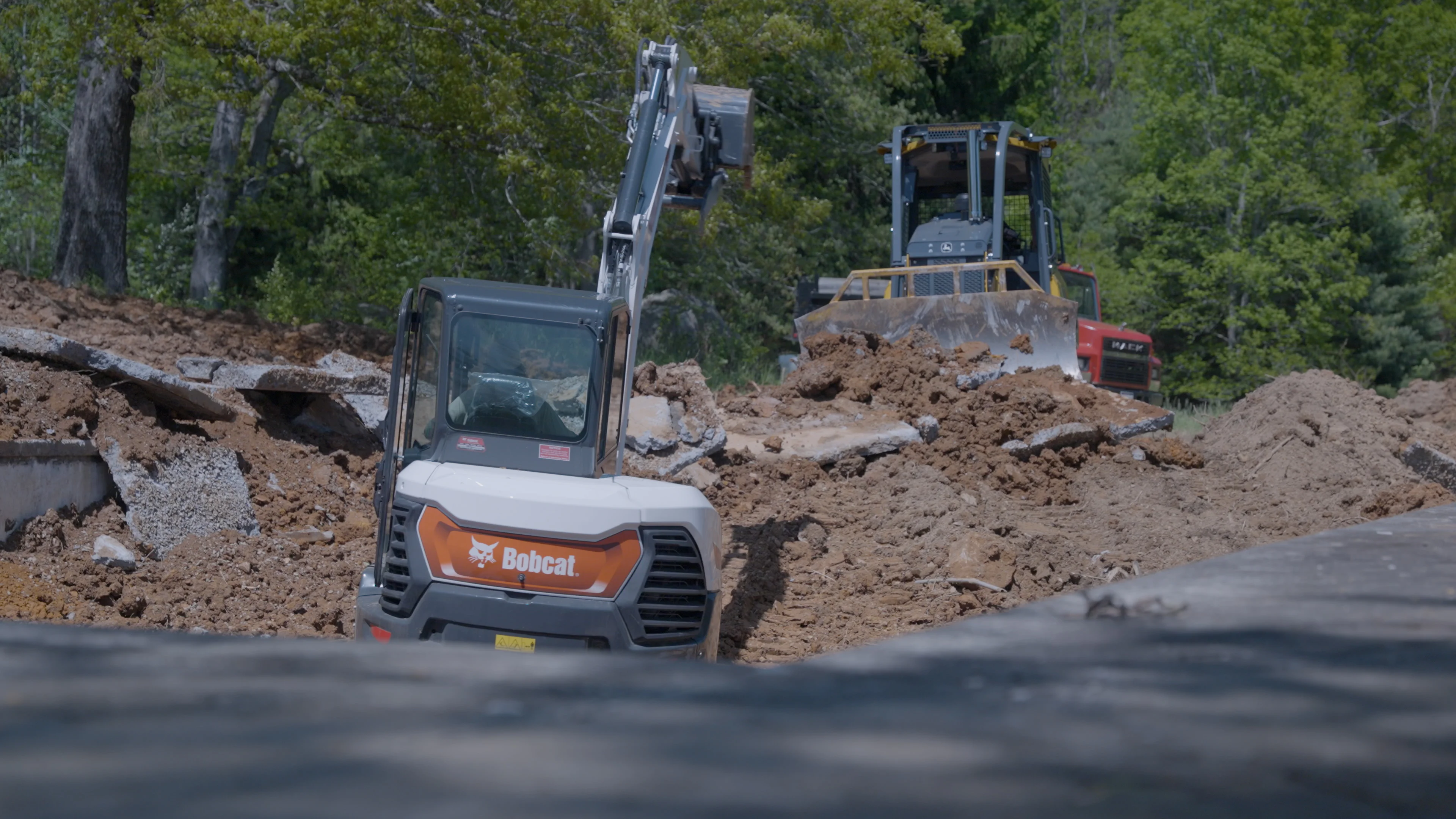 Excavation equipment working on a cleared property site